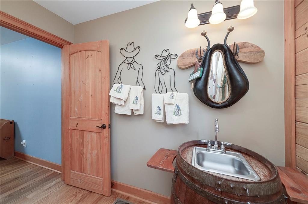 570 Eskew Road McDonough, GA 30252 - Photo 46 of 89 a bathroom with a sink and a mirror