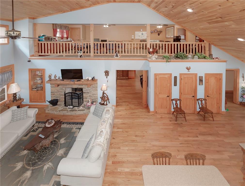 570 Eskew Road McDonough, GA 30252 - Photo 58 of 89 a living room with furniture and a fireplace
