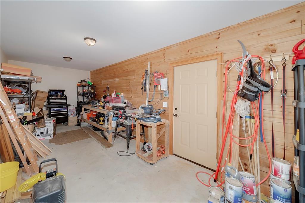 570 Eskew Road McDonough, GA 30252 - Photo 62 of 89 a view of a room with gym equipment