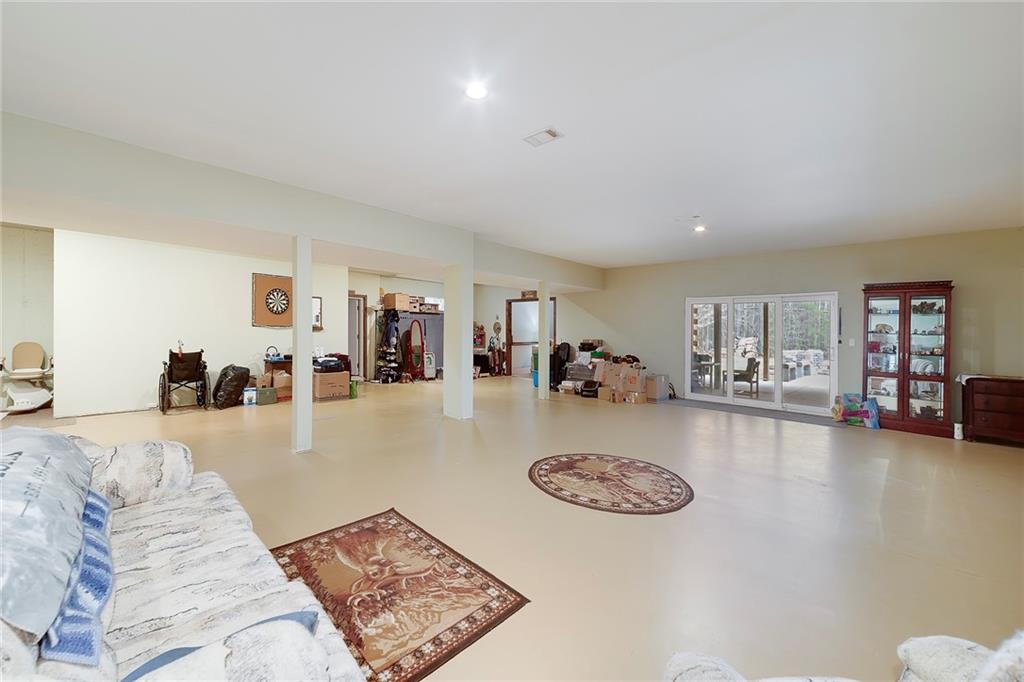 570 Eskew Road McDonough, GA 30252 - Photo 66 of 89 a view of a livingroom with furniture and wooden floor