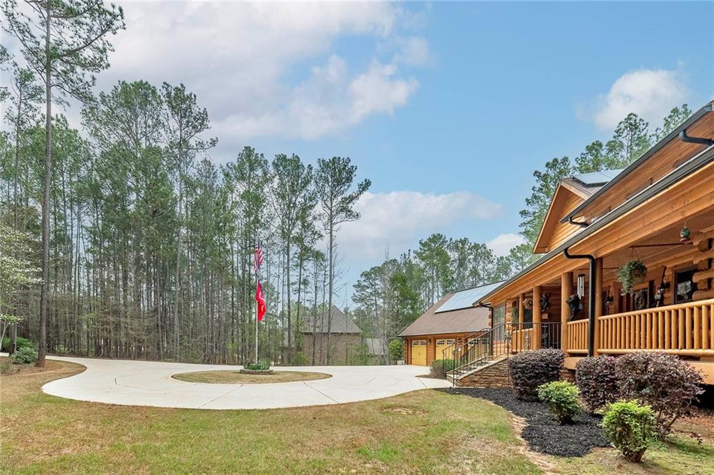 570 Eskew Road McDonough, GA 30252 - Photo 79 of 89 a view of a house with entertaining space
