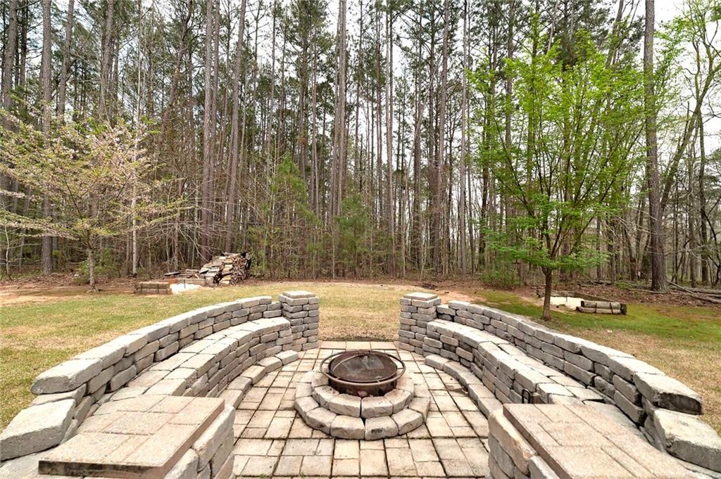 570 Eskew Road McDonough, GA 30252 - Photo 8 of 89 a view of a swimming pool with a yard