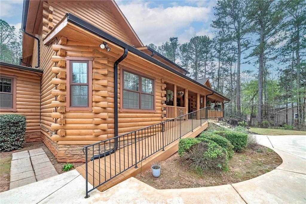 570 Eskew Road McDonough, GA 30252 - Photo 81 of 89 a front view of a house with a porch