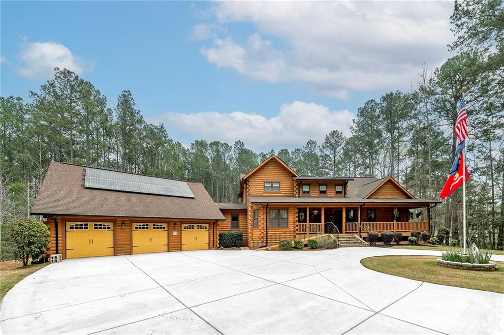 570 Eskew Road McDonough, GA 30252 - Photo 87 of 89 a front view of house with yard outdoor seating and barbeque oven