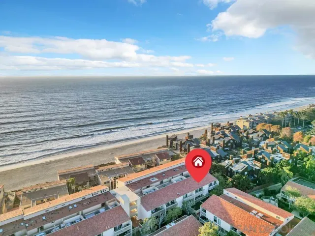 a view of swimming pool with an outdoor seating