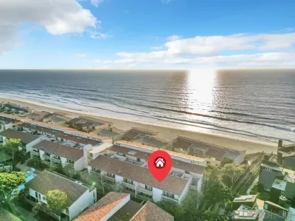 a view of a street with an ocean view