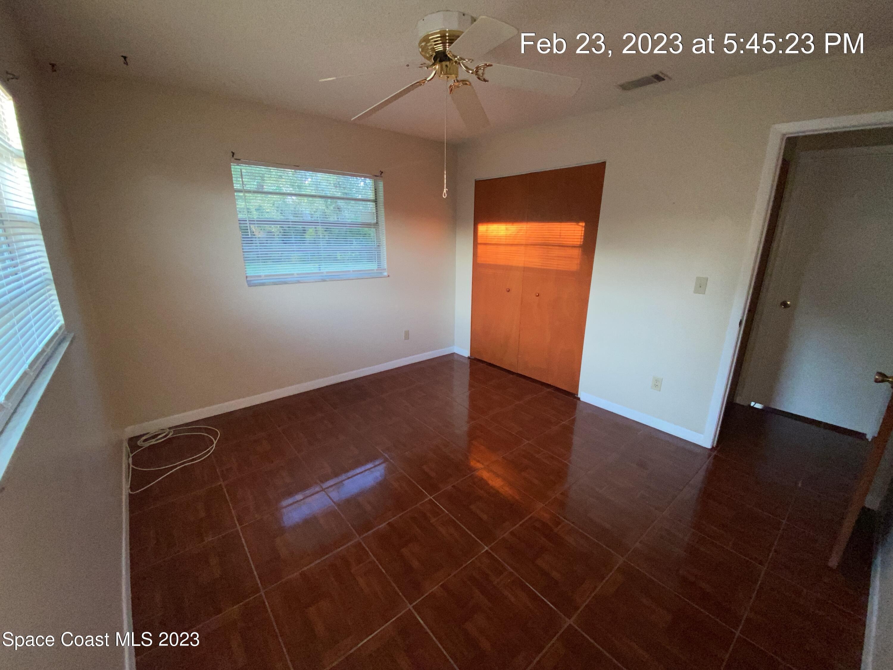 304 Darrow Avenue Melbourne, FL 32901 - Photo 18 of 31 a view of an empty room with a window