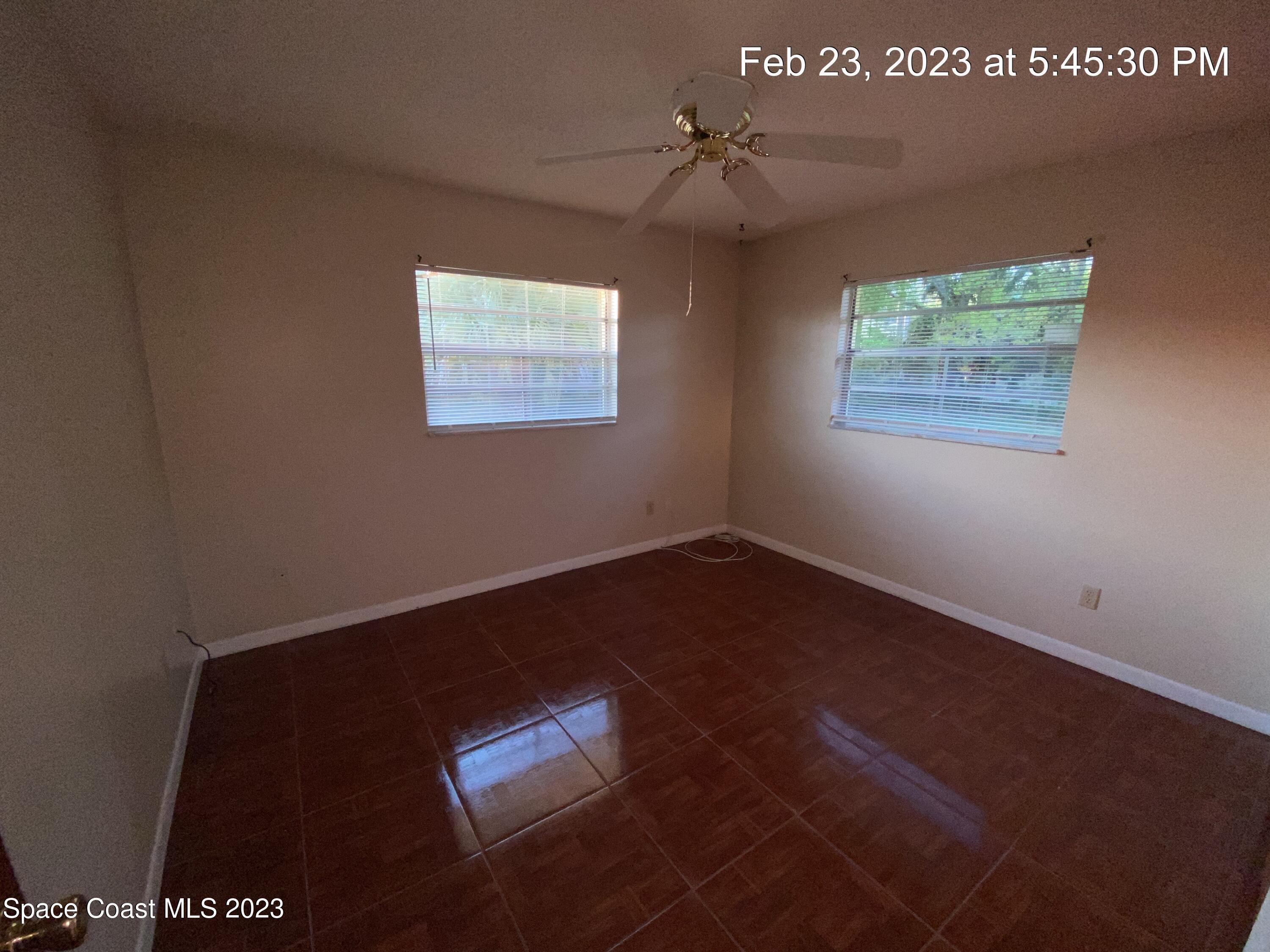 304 Darrow Avenue Melbourne, FL 32901 - Photo 19 of 31 a view of an empty room with a window