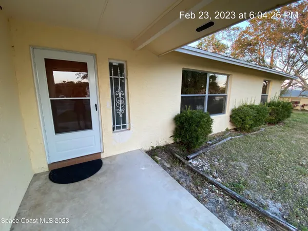a view of a backyard of a house