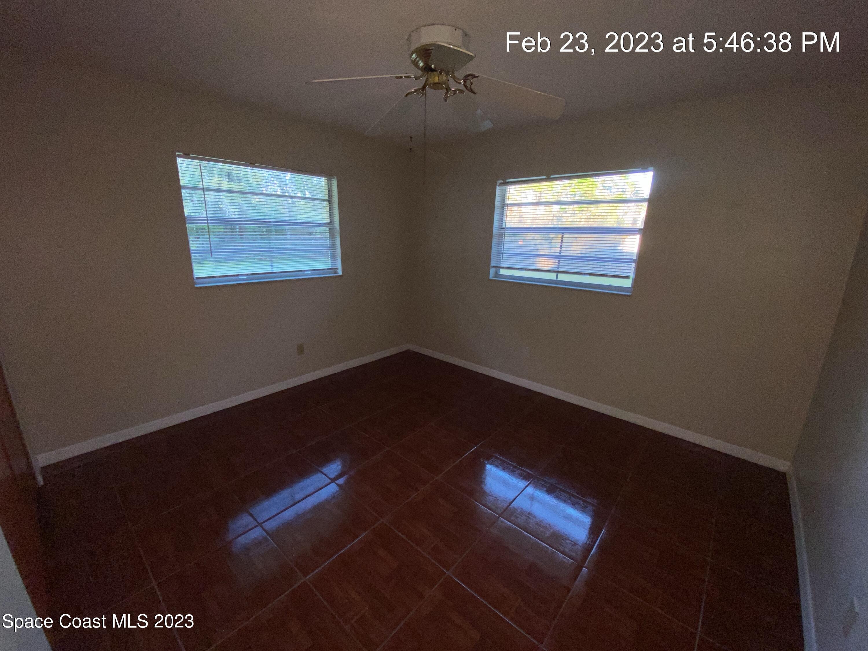 304 Darrow Avenue Melbourne, FL 32901 - Photo 21 of 31 a view of an empty room with windows