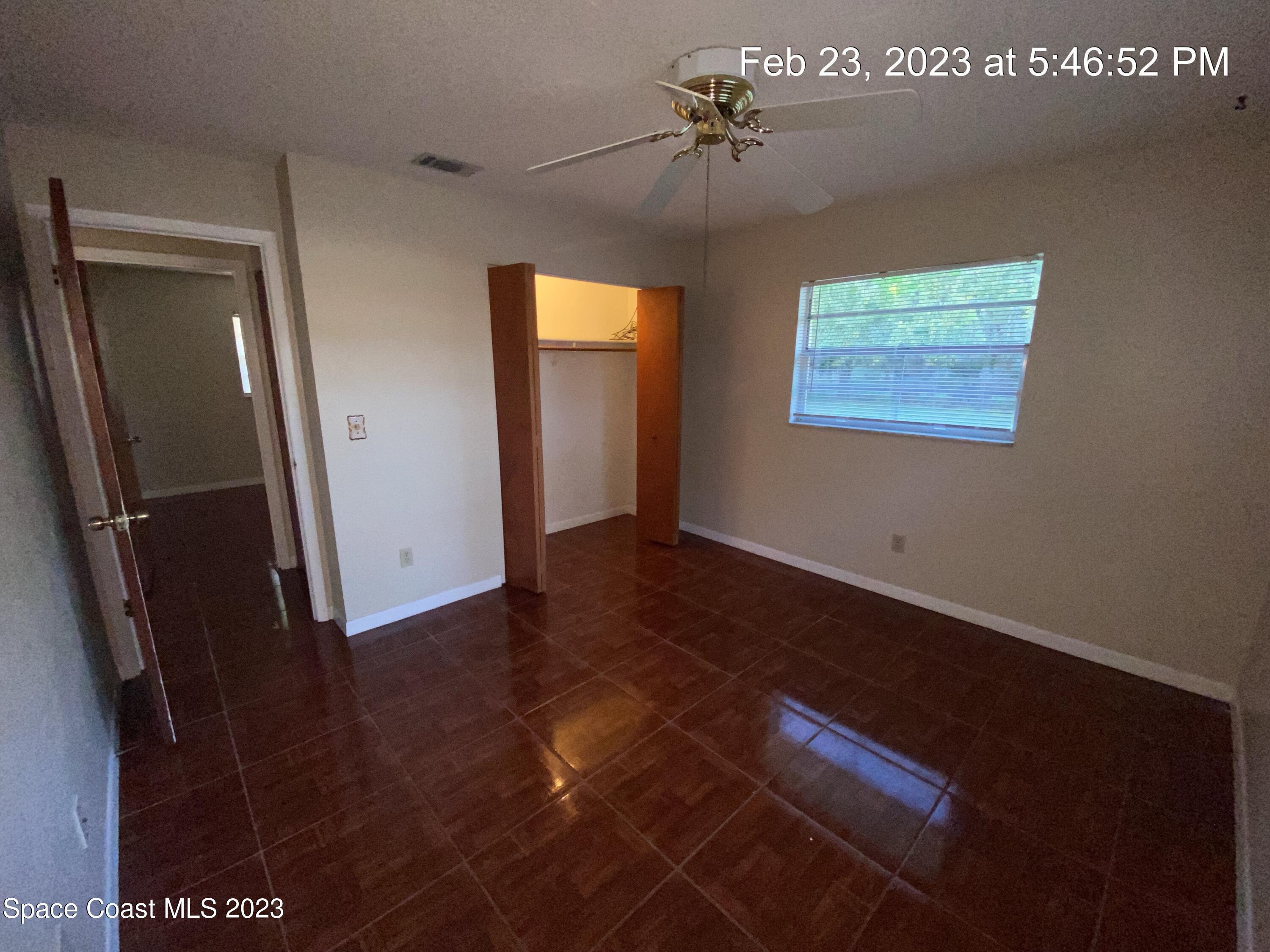 304 Darrow Avenue Melbourne, FL 32901 - Photo 22 of 31 a view of an empty room with a window