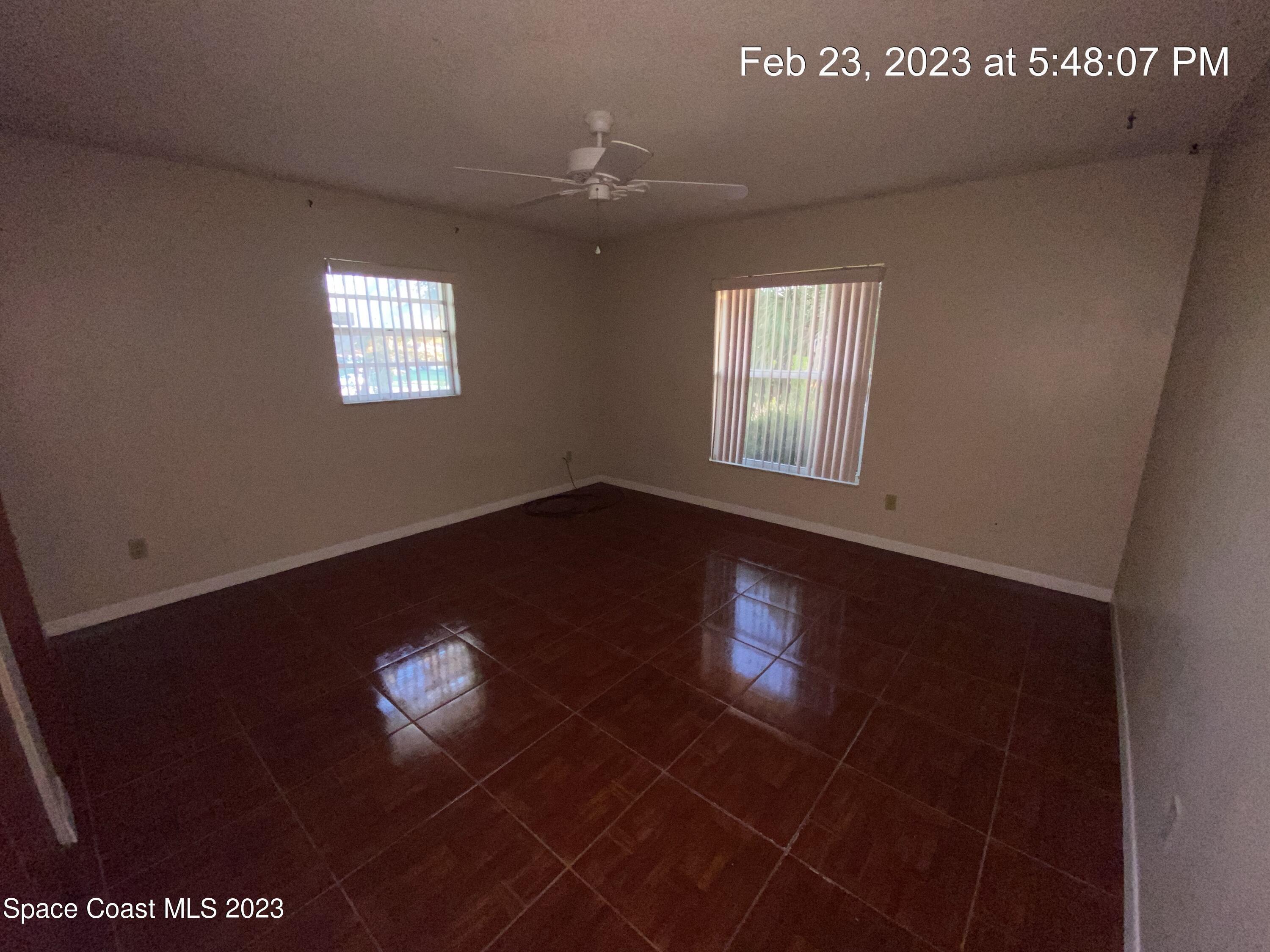 304 Darrow Avenue Melbourne, FL 32901 - Photo 23 of 31 a view of an empty room with a window