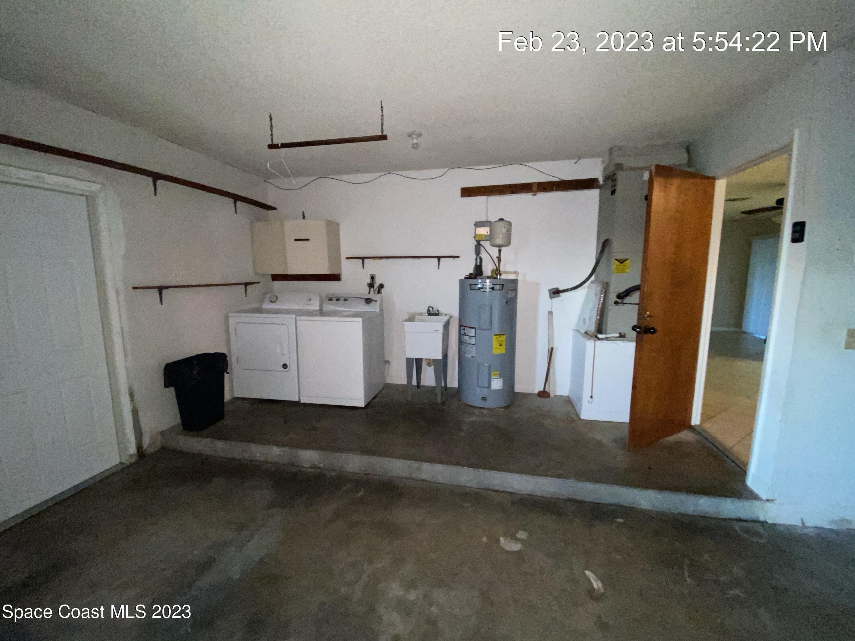 304 Darrow Avenue Melbourne, FL 32901 - Photo 28 of 31 a view of a storage & utility room with stairs