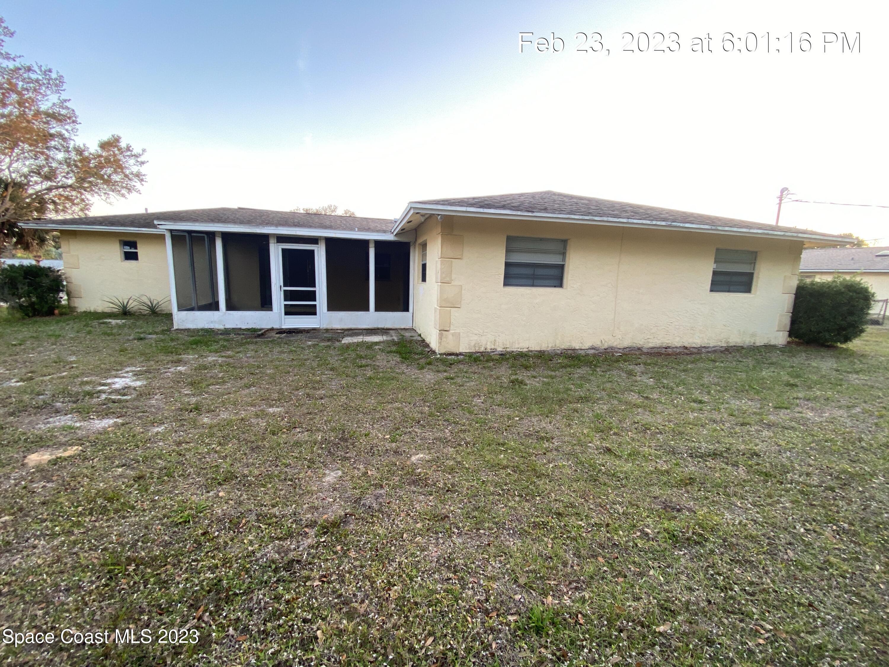 304 Darrow Avenue Melbourne, FL 32901 - Photo 31 of 31 a house that has a big yard in front of it