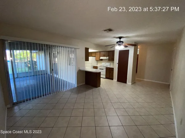 a view of a kitchen with a sink
