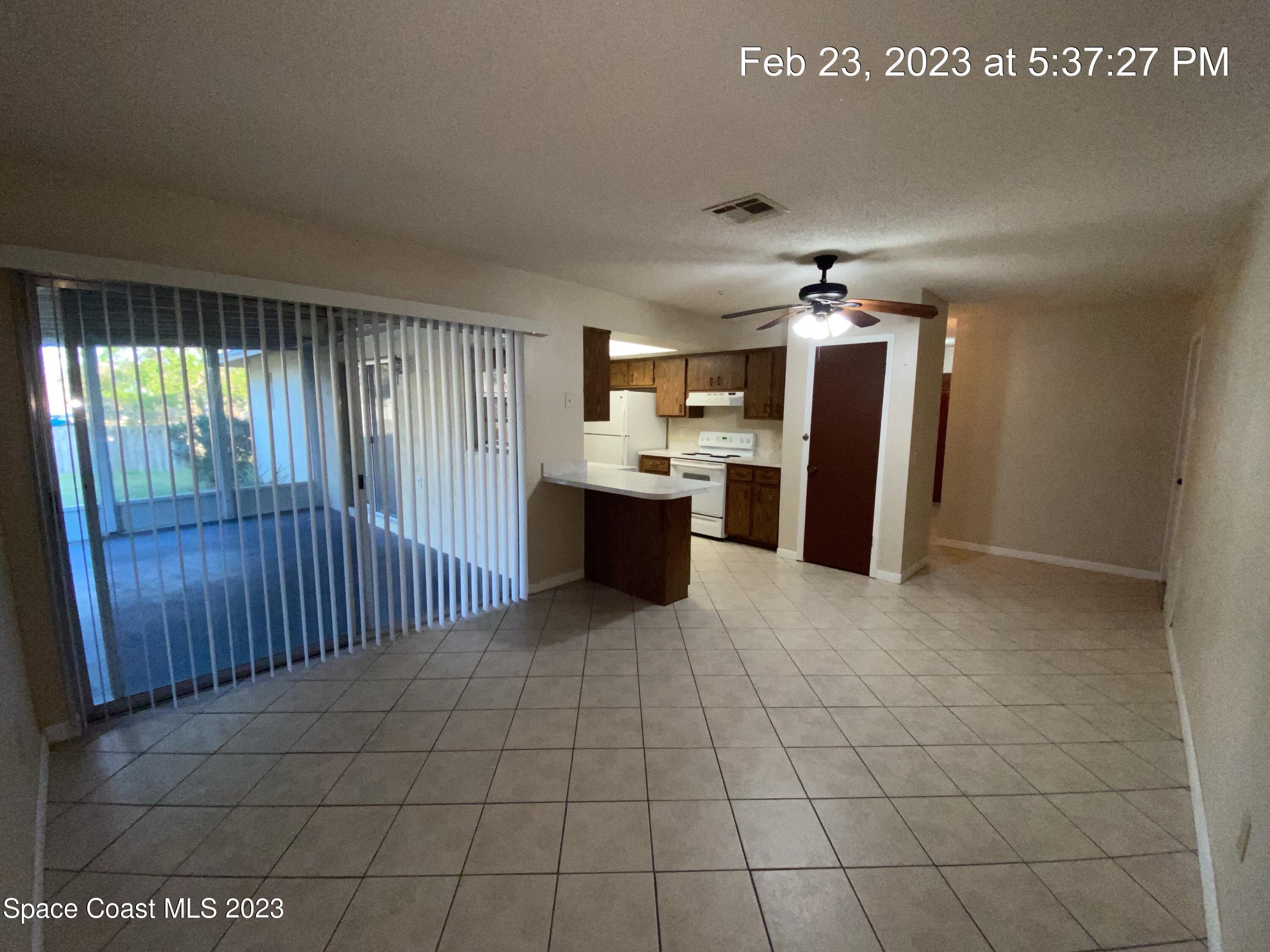 304 Darrow Avenue Melbourne, FL 32901 - Photo 9 of 31 a view of a kitchen with a sink