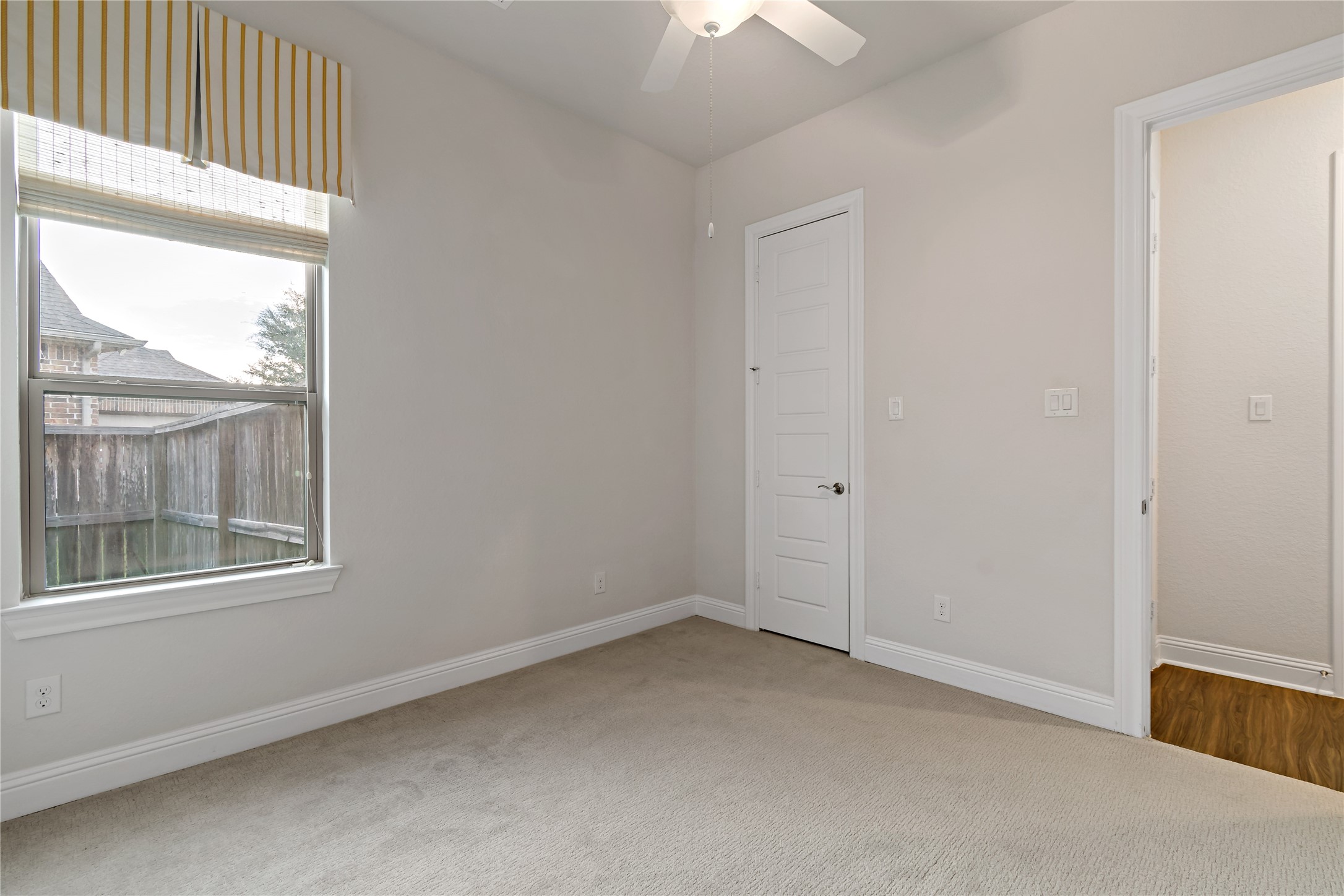 4802 Gingerwood Trace Lane Rosharon, TX 77583 - Photo 16 of 44 an empty room with a window