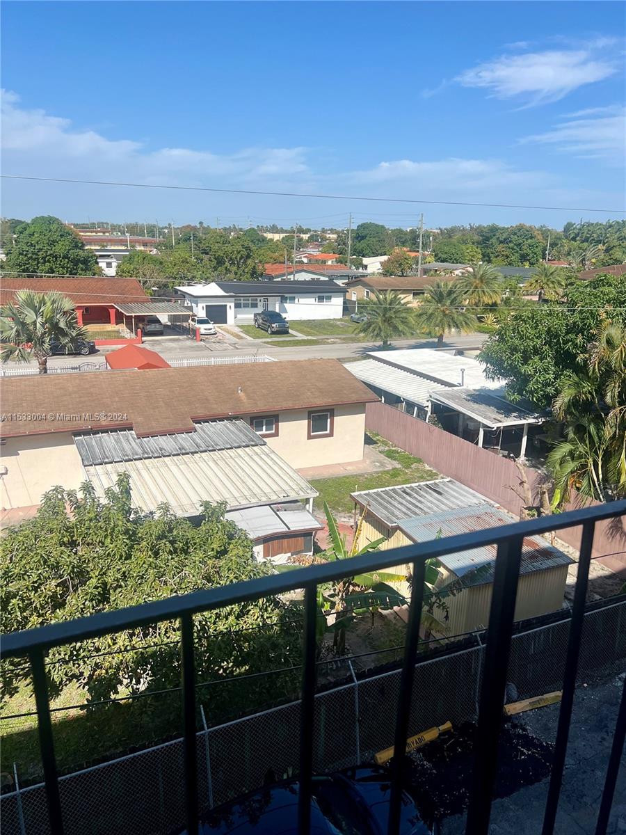 a view of a balcony with an outdoor space