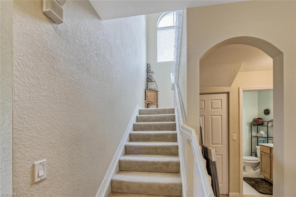 2084 Par Drive Naples, FL 34120 - Photo 16 of 29 a view of staircase with white walls