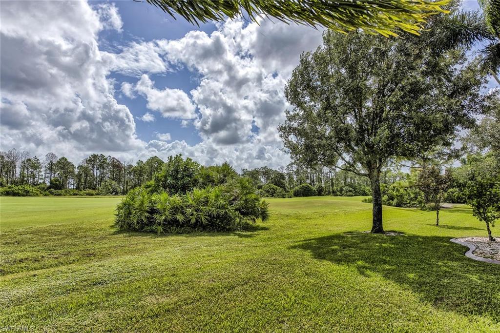 2084 Par Drive Naples, FL 34120 - Photo 2 of 29 a view of an ocean with a big yard