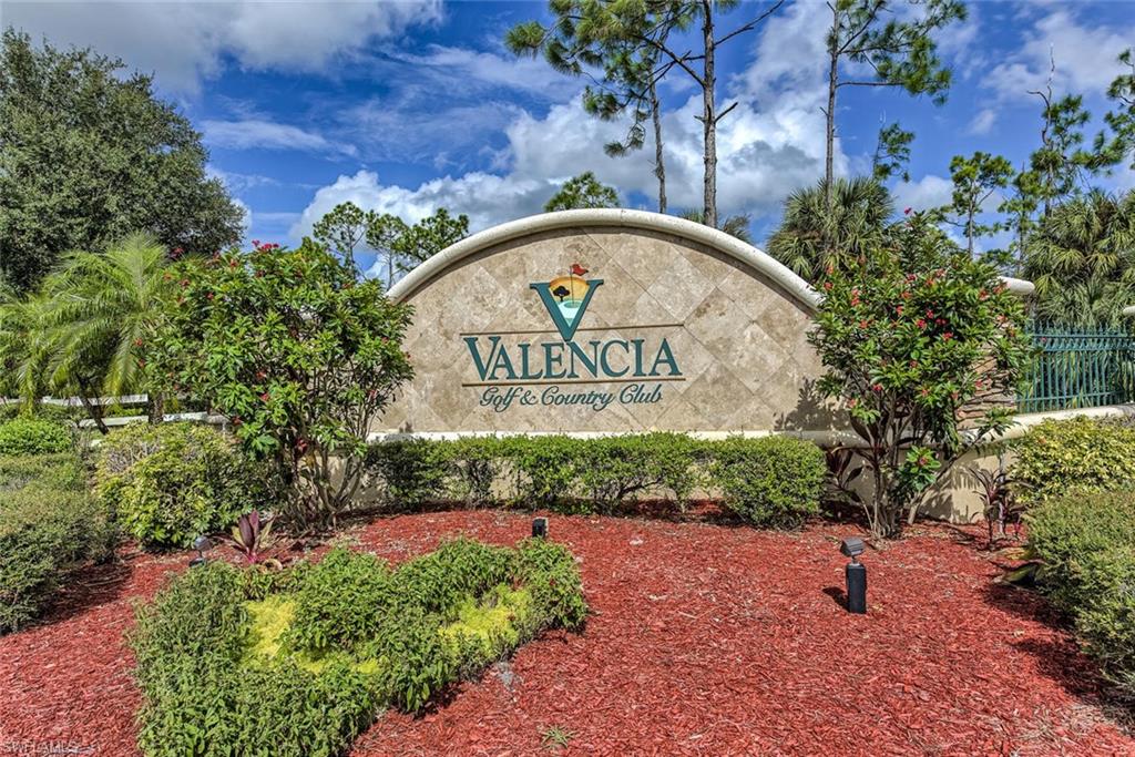 2084 Par Drive Naples, FL 34120 - Photo 29 of 29 a sign board with a house in the background
