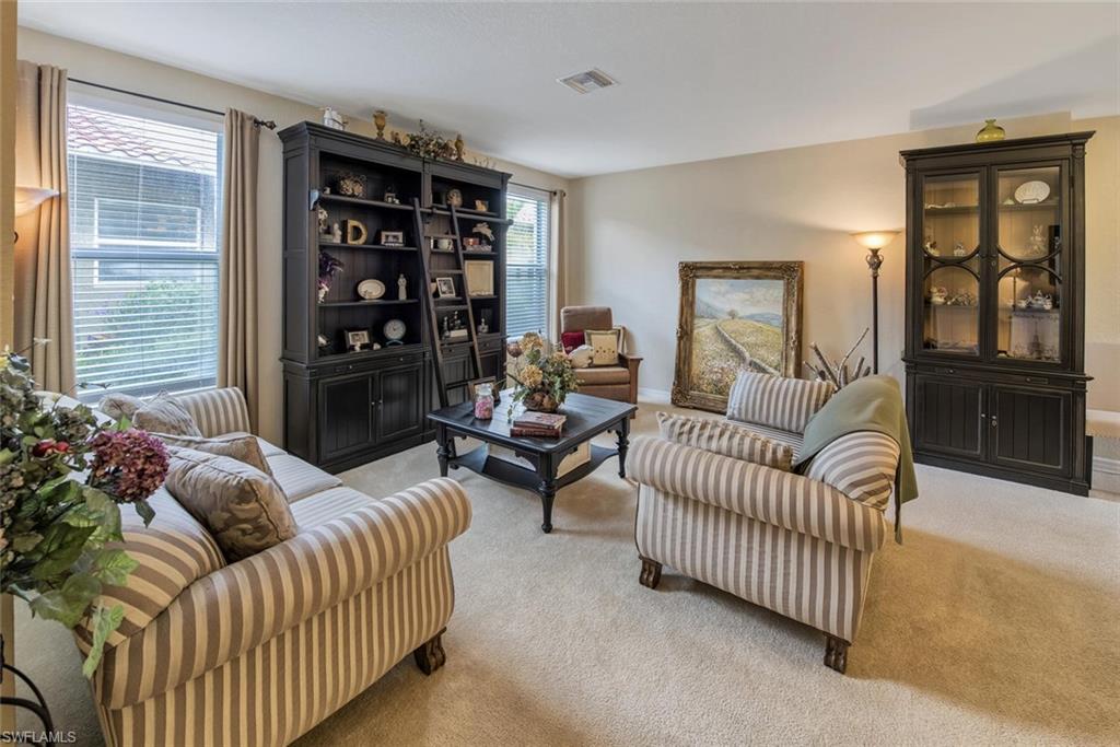 2084 Par Drive Naples, FL 34120 - Photo 7 of 29 a living room with furniture and a window