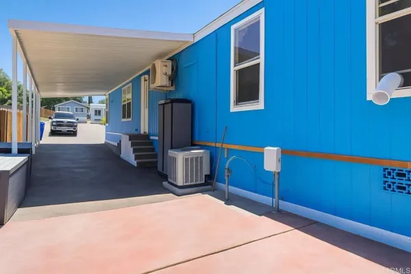a terrace with a table and chairs