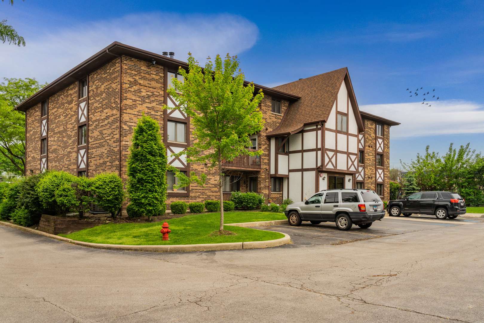 10640 Ridgeland Avenue, Unit 1C Chicago Ridge, IL 60415 - Photo 1 of 16 a view of car parked in front of house