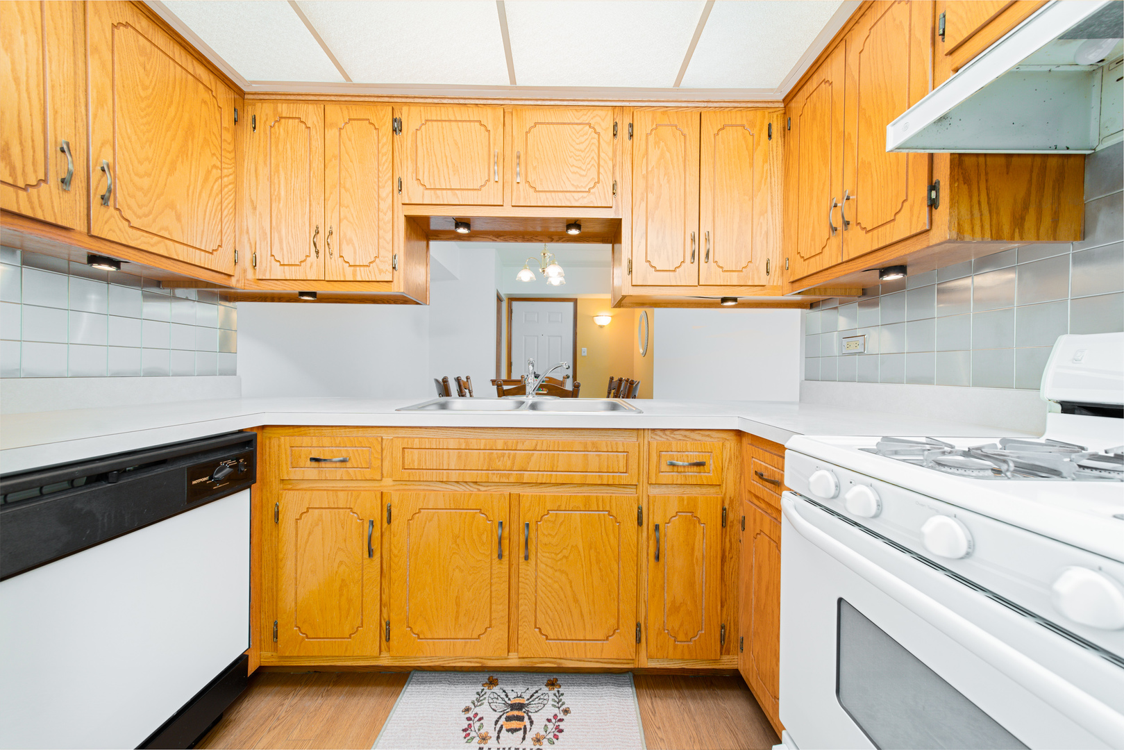 10640 Ridgeland Avenue, Unit 1C Chicago Ridge, IL 60415 - Photo 9 of 16 a utility room with stainless steel appliances granite countertop a sink and a cabinets