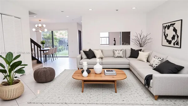 a white toilet sitting next to a shower