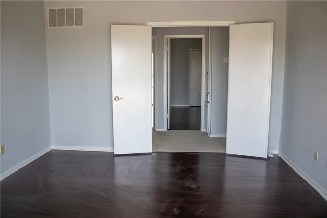 a view of a livingroom with wooden floor