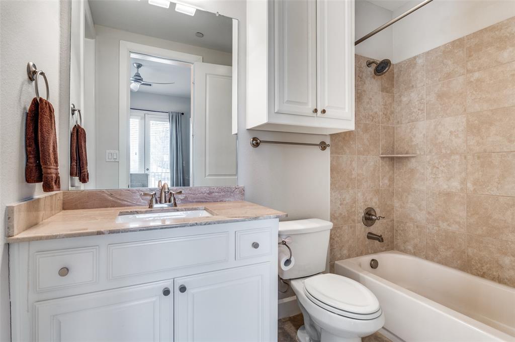 5038 Meridian Lane Addison, TX 75001 - Photo 5 of 26 1st floor bathroom