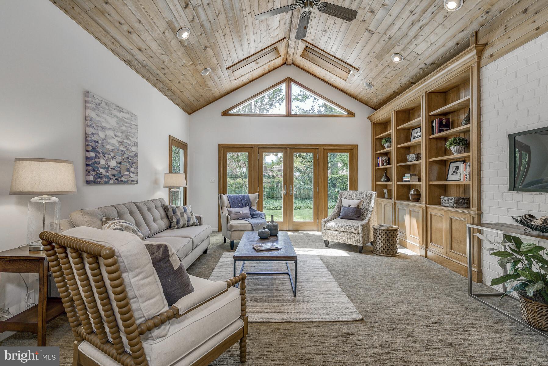5606 Pollard Road Bethesda, MD 20816 - Photo 5 of 47 FR w cedar cathedral ceiling. Doors to backyard.