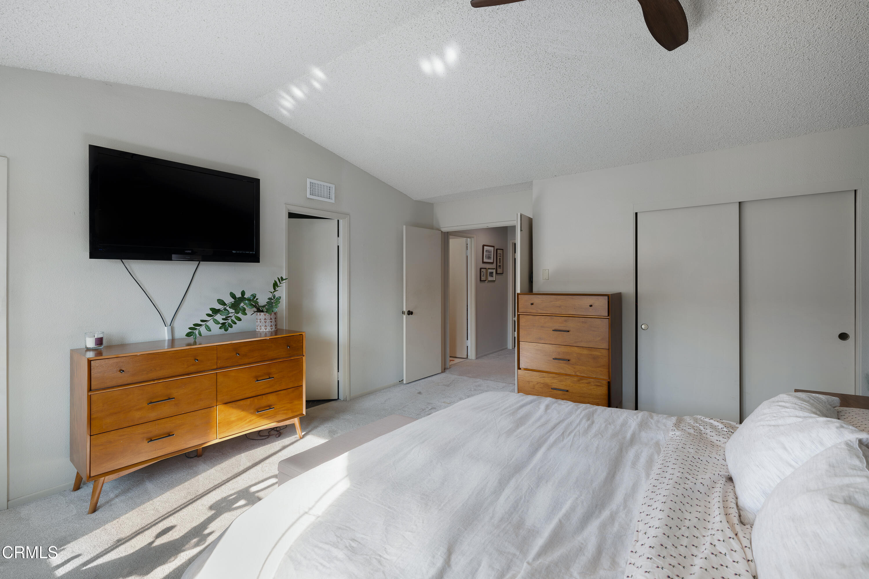 896 Swiss Trails Road Duarte, CA 91010 - Photo 20 of 33 a bedroom with furniture and a flat screen tv