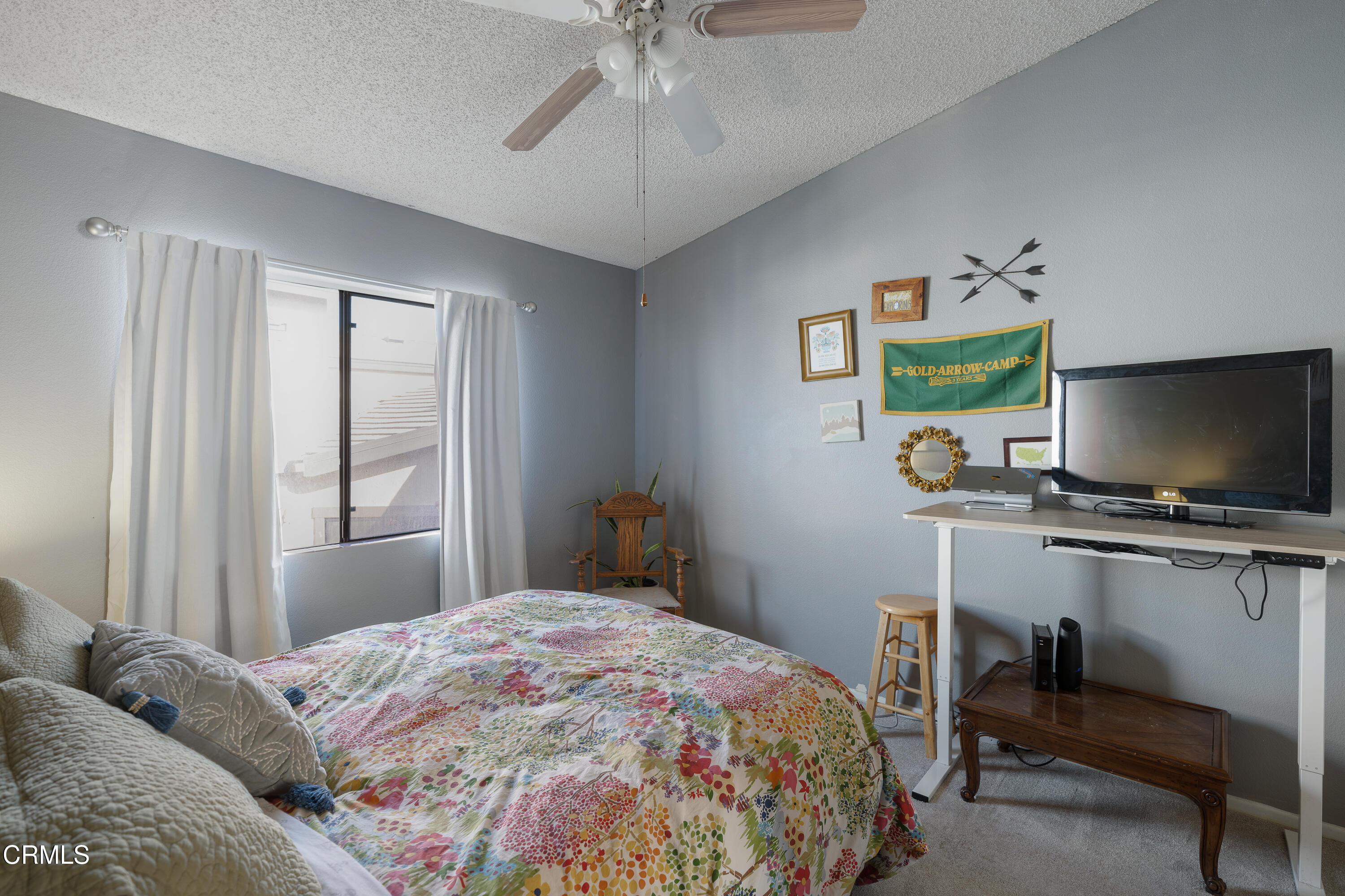 896 Swiss Trails Road Duarte, CA 91010 - Photo 24 of 33 a bedroom with a bed and a flat screen tv