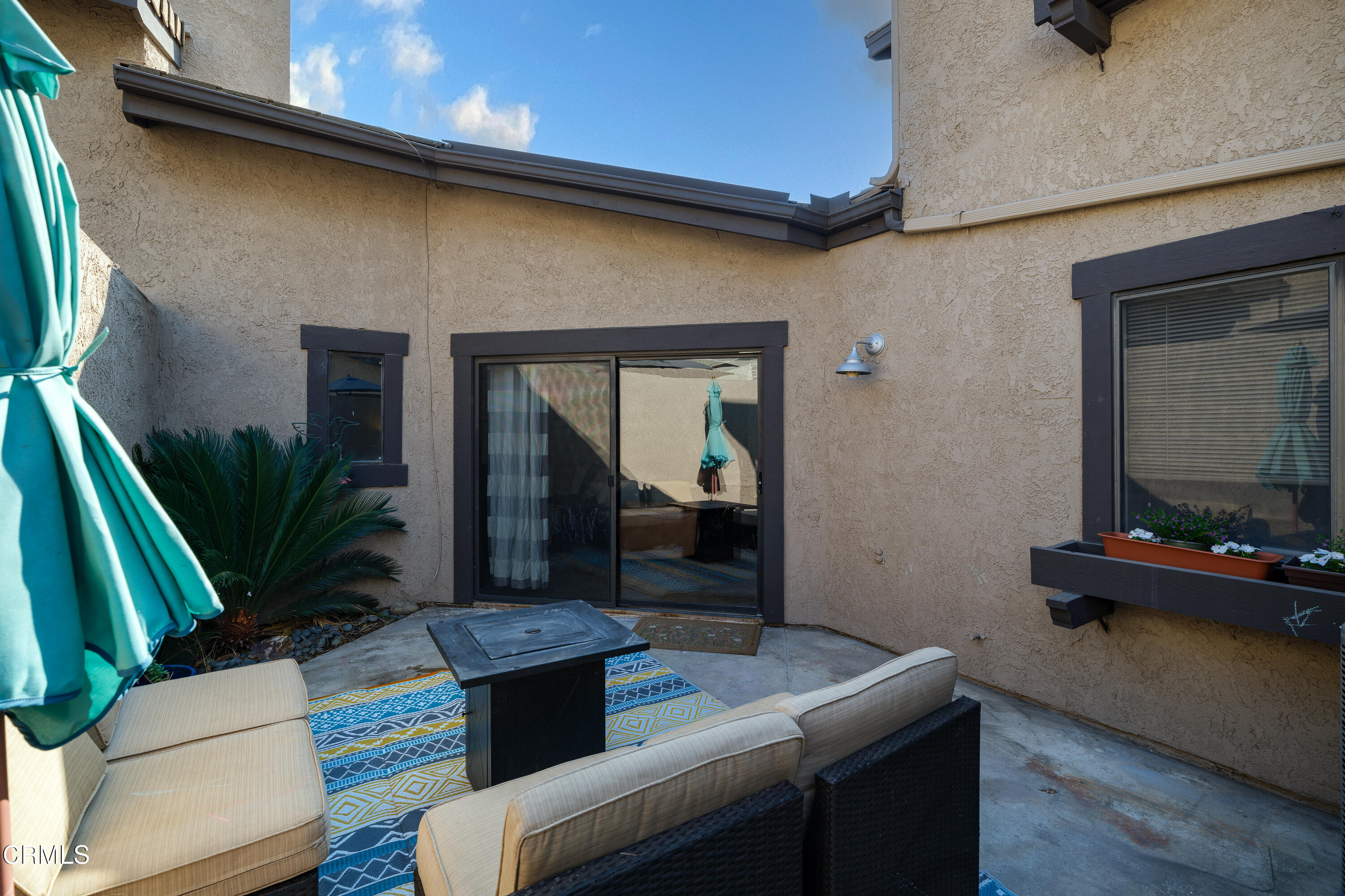 896 Swiss Trails Road Duarte, CA 91010 - Photo 27 of 33 a dining room with furniture and a potted plant