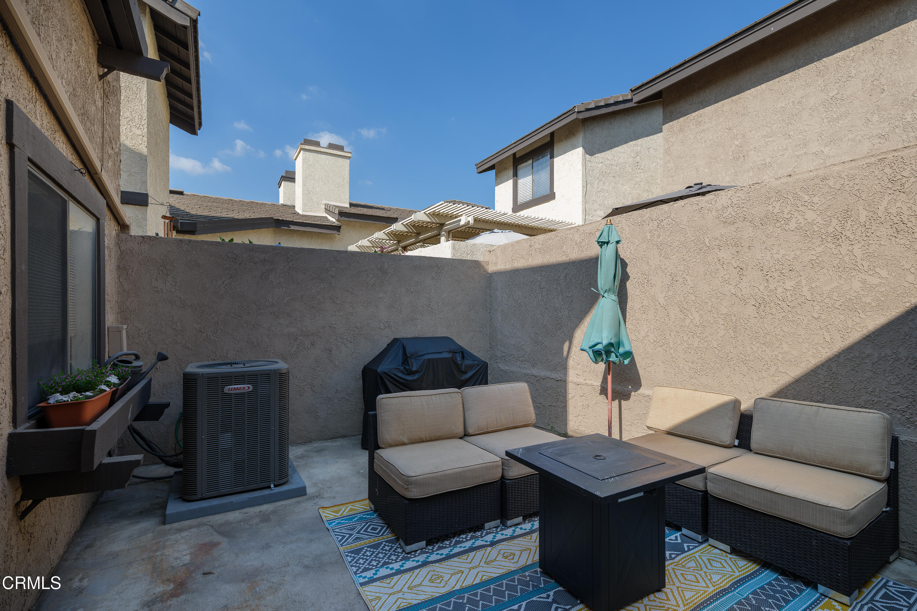 896 Swiss Trails Road Duarte, CA 91010 - Photo 28 of 33 a view of a patio with couches table and chairs and potted plants