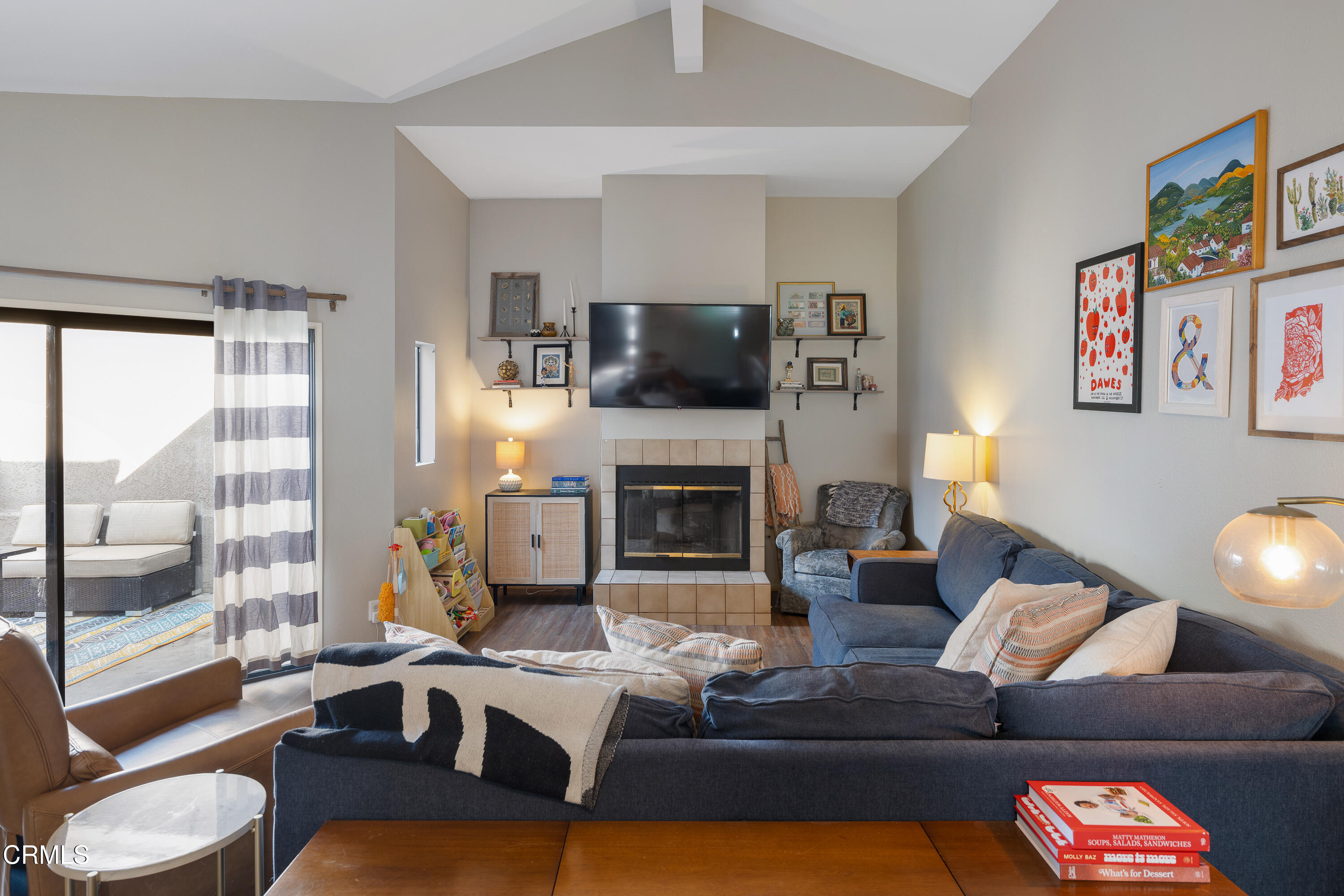 896 Swiss Trails Road Duarte, CA 91010 - Photo 7 of 33 a living room with furniture a flat screen tv and a fireplace