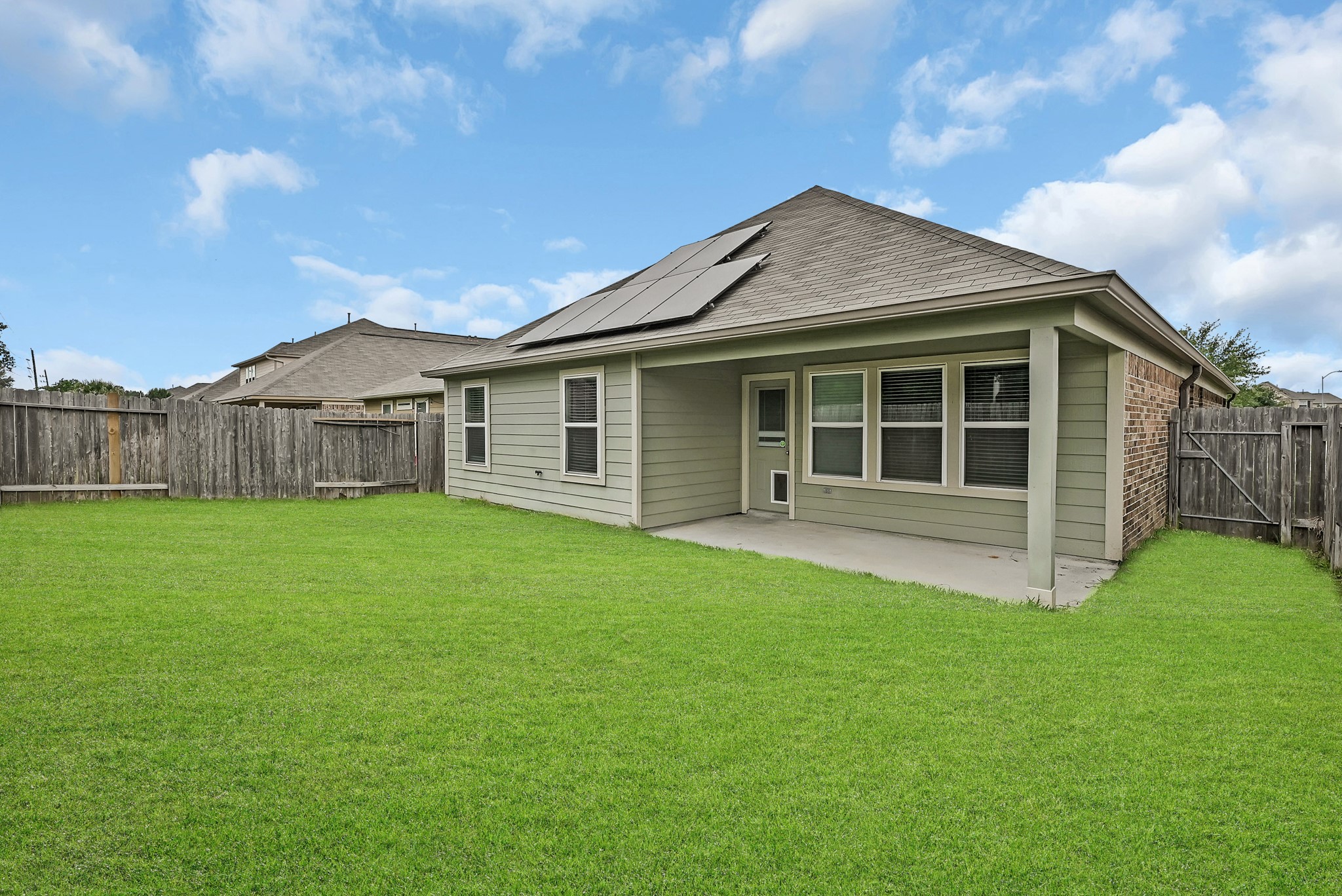 20039 Sunshine Ridge Lane Cypress, TX 77429 - Photo 21 of 22 Confortable covered patio and Great green area in the back yard to enjoy your outdoor activities all year long. NO BACK NEIGHBORNS.