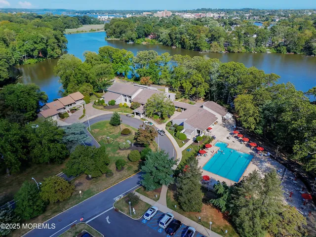 an aerial view of house with yard