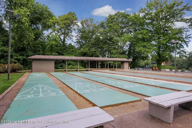 a view of house with swimming pool
