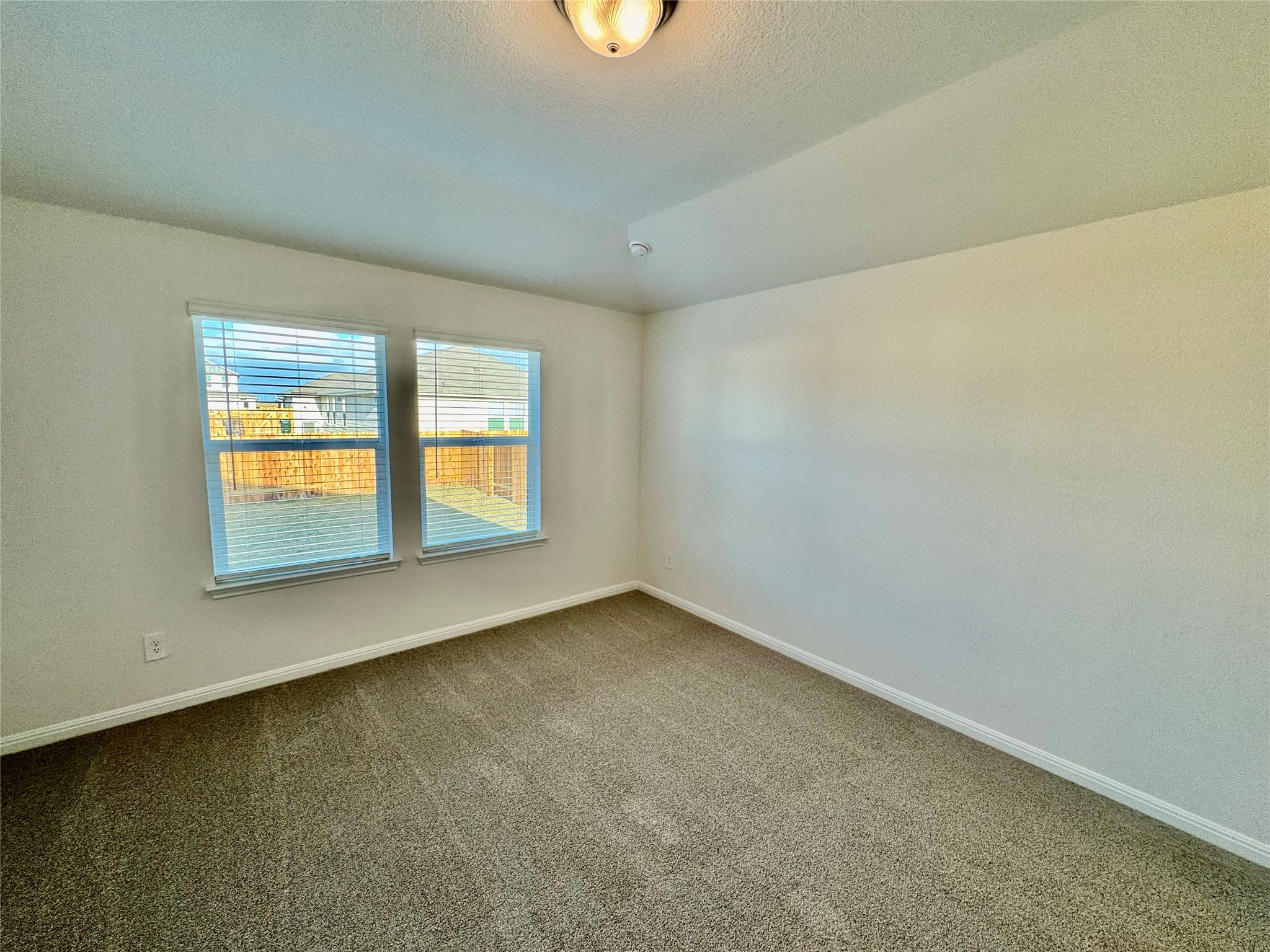 175 Fossil Drive Kyle, TX 78640 - Photo 3 of 7 an empty room with a window