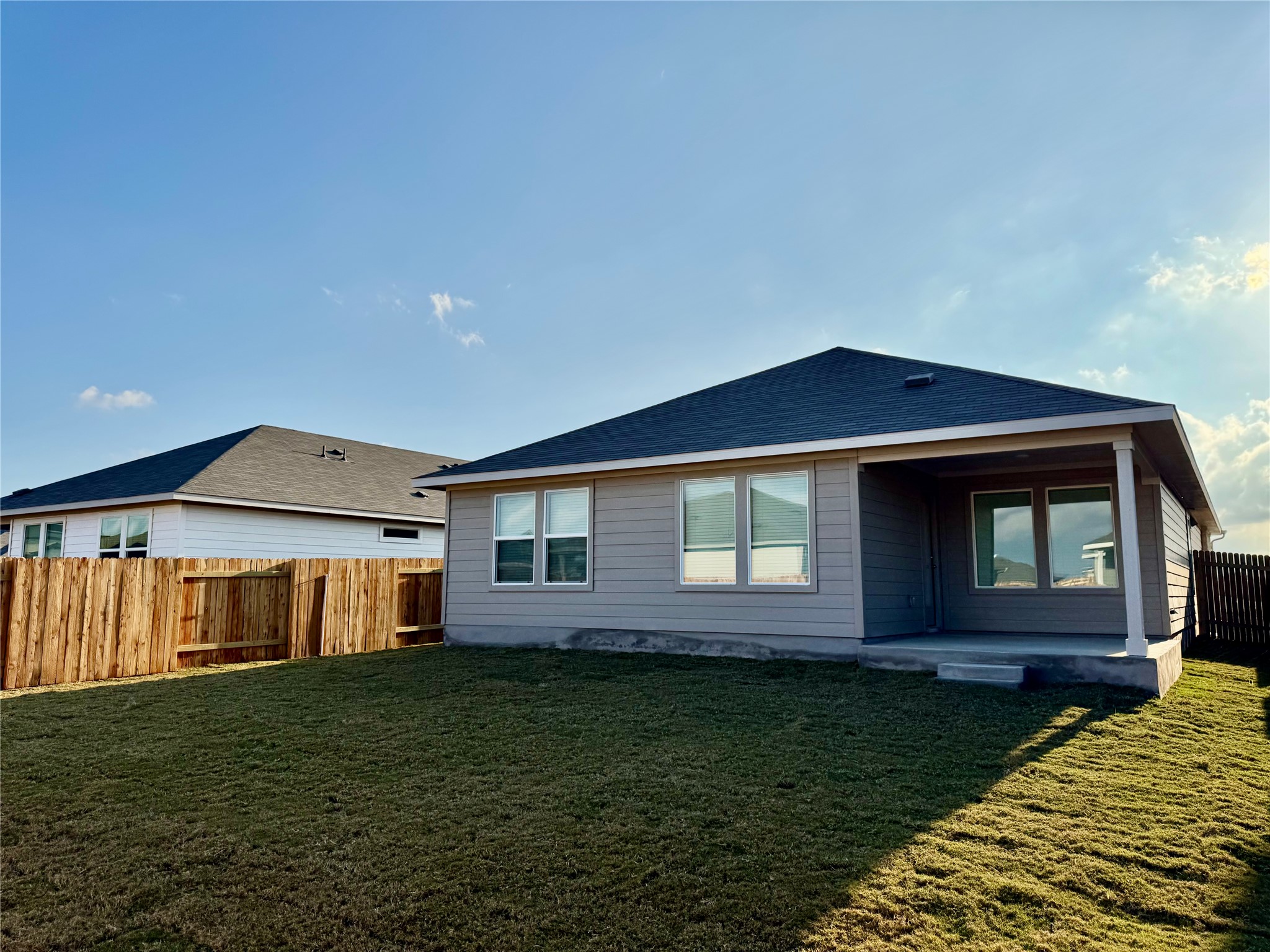 175 Fossil Drive Kyle, TX 78640 - Photo 5 of 7 a front view of a house with a yard