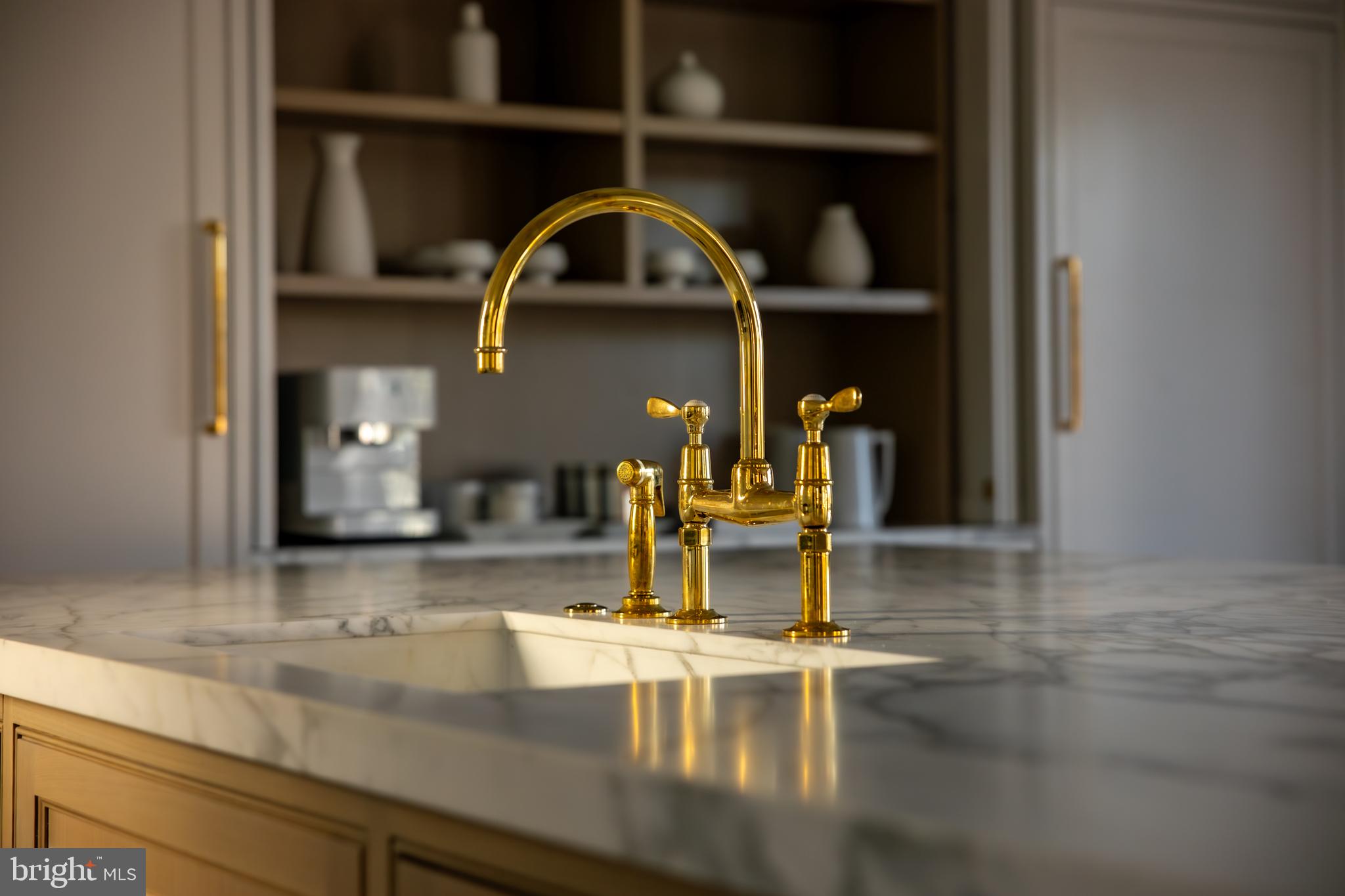 4939 Quebec Street Northwest Washington, DC 20016 - Photo 13 of 50 White Calacatta Countertops w/Integrated Sink