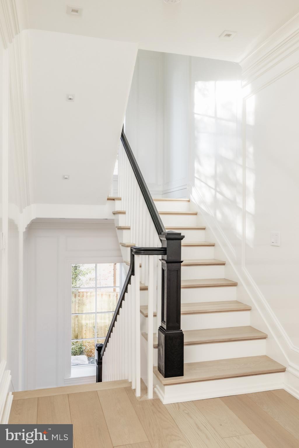 4939 Quebec Street Northwest Washington, DC 20016 - Photo 22 of 50 Light Filled Stair Hall w/Custom Paneling