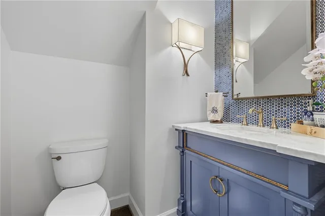 a dining room with a table and chairs