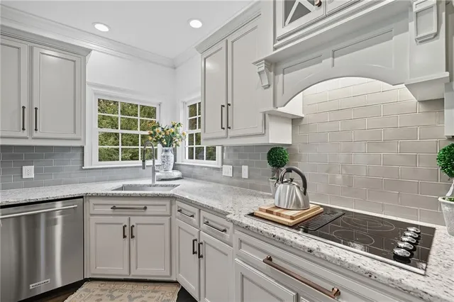 a view of balcony with two chairs and a potted plant