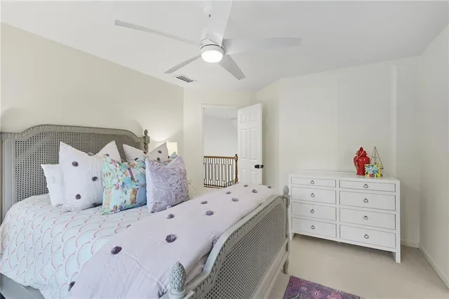 an aerial view of a house with a yard and trees