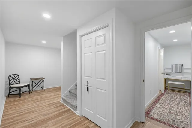 an aerial view of residential house with outdoor space and trees around