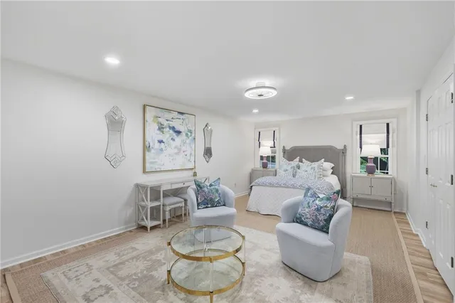 an aerial view of a houses with outdoor space and lake view